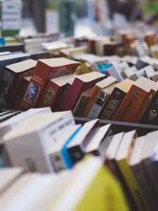 books in bins in a bookshop
